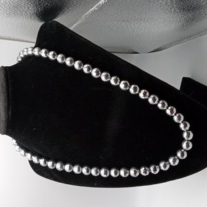 Sterling silver and hematite bead necklace  Marked 925.